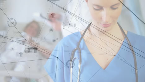 data processing and network connections animation over healthcare professional in hospital