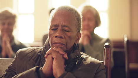 senior african woman, praying