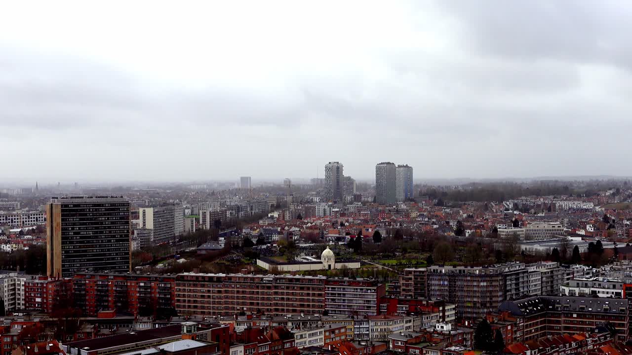 A slow zooming out video of Brussels city from a top view