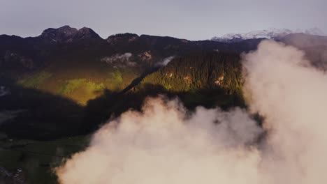 misty mountain valley at sunrise/sunset