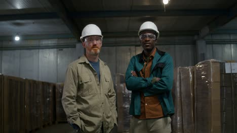 two workers in a warehouse