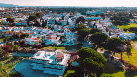 coastal village in portugal with lush greenery and unique architecture