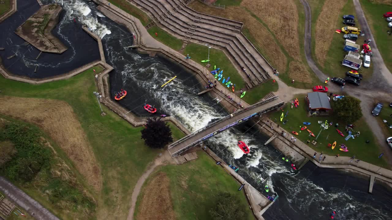 Drone video captures the rapids and kayaks rushing down the course of the Holme Pierrepont White Water Course.
