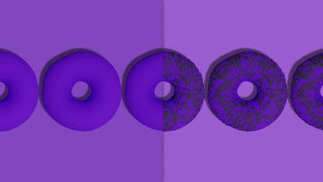 cinemagraph de rosquillas rociadas con esmalte violeta en un fondo abstracto