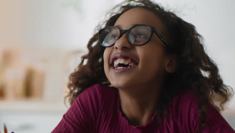 smiling girl with glasses