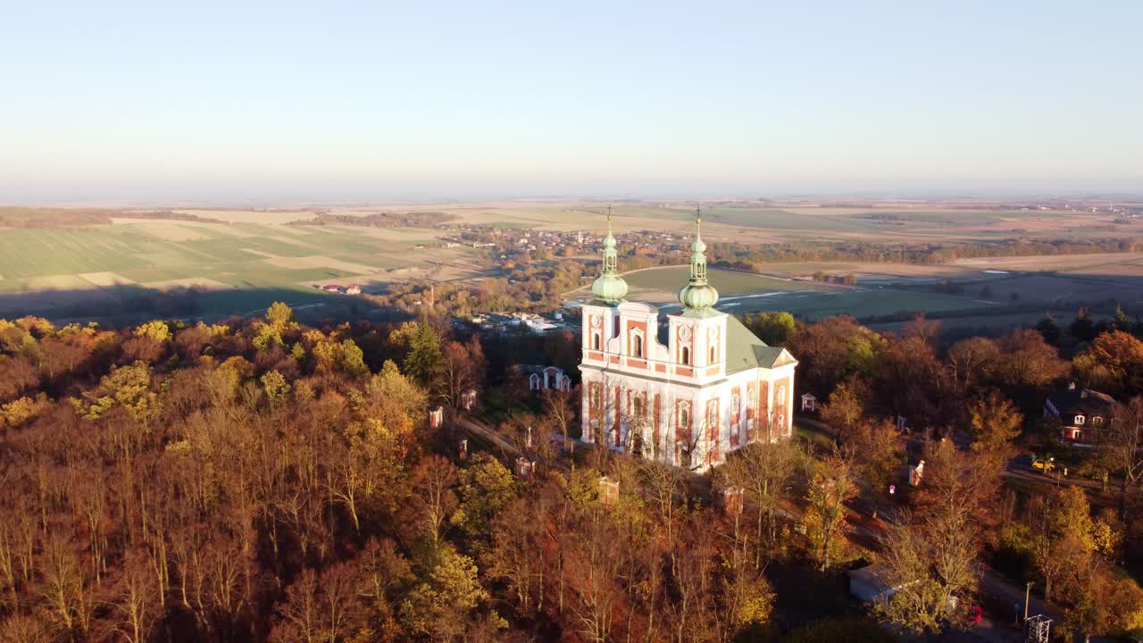 Church of Our Lady of Sorrows and Exaltation of the Holy Cross During Autumn In Czech Republic. - aerial shot