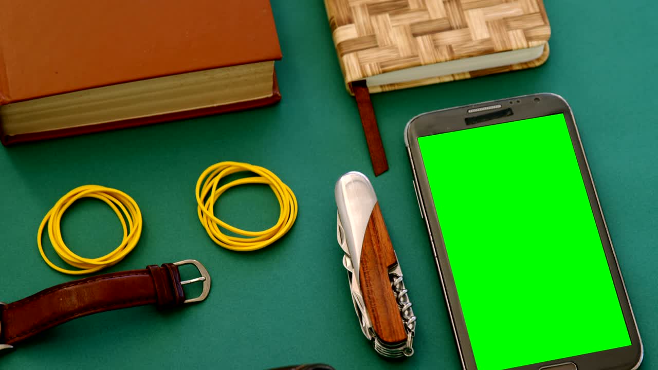 organizador, teléfono móvil, reloj de pulsera y suministros de oficina 4k