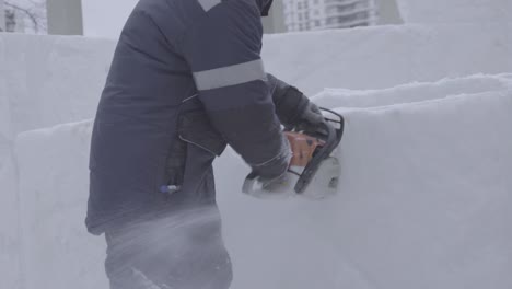 snow carving with chainsaw