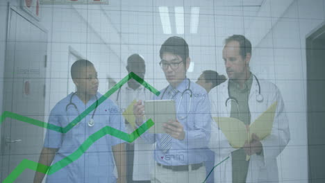 discussing patient data, doctors with financial graph overlay in hospital corridor