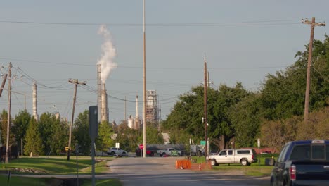 establishing shot of chemical refinery plant in pasadena, texas community