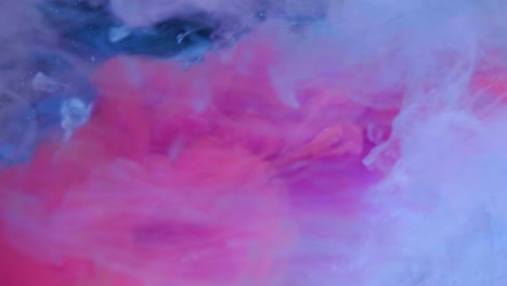 fondo de pintura de tinta colorida en el agua, flujo de tinta bajo el agua