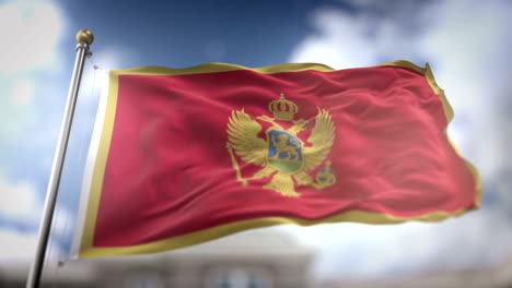 montenegro flag waving slow motion 3d rendering blue sky background - seamless loop 4k