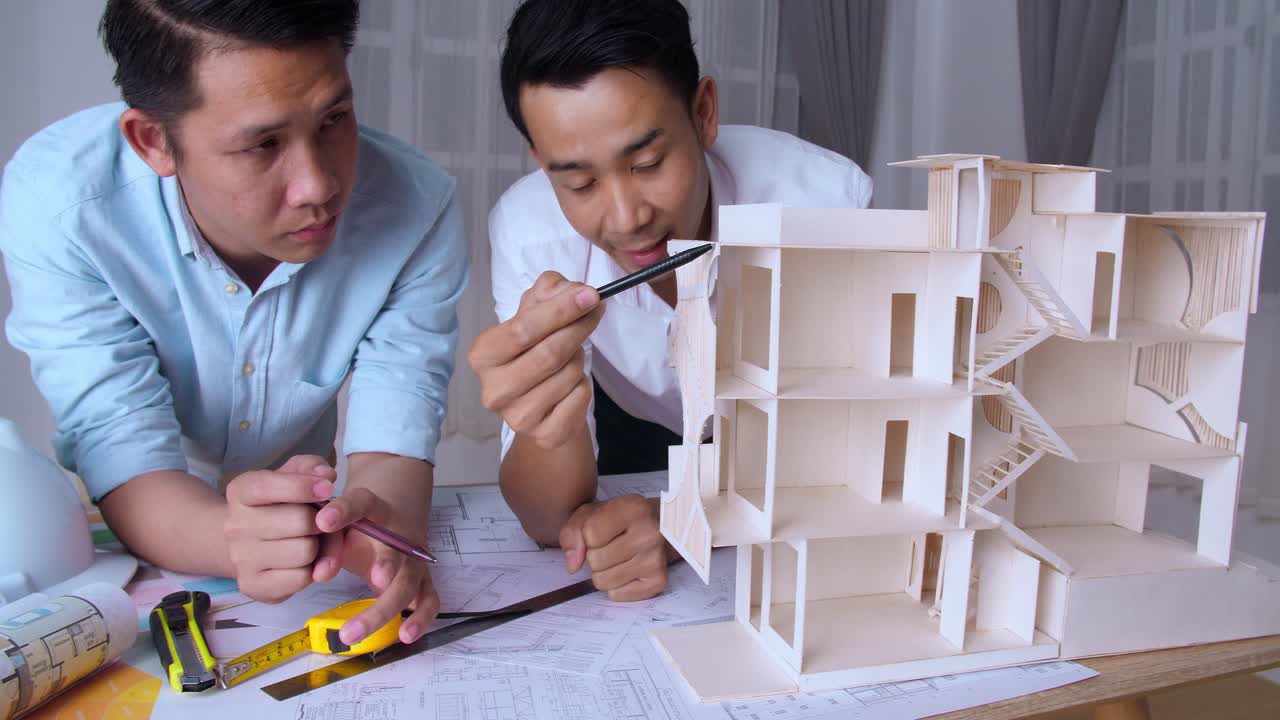 Confident Team Of Engineers Working Together In A Architect Studio