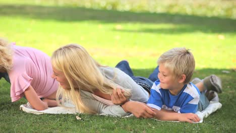 young woman and her two children having fun