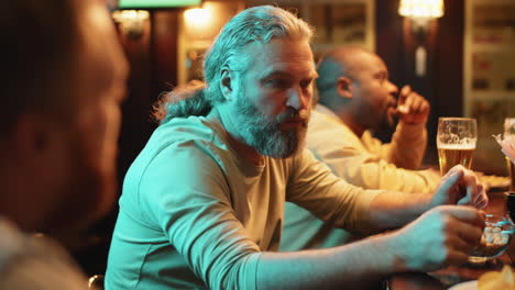 male friends relaxing in pub