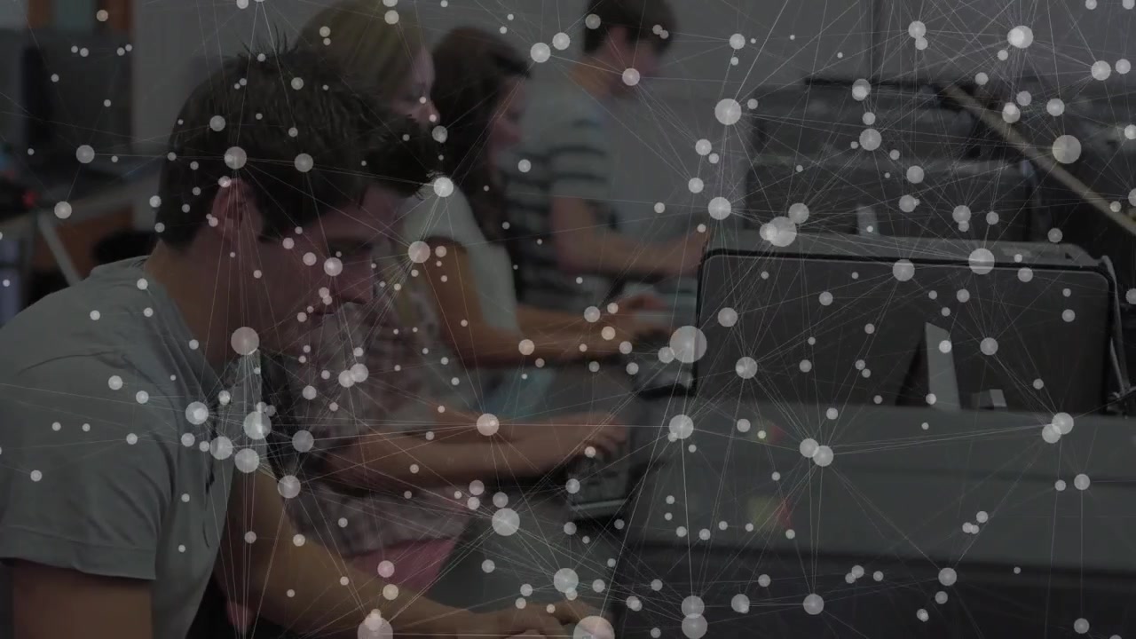 Animation of network of connections over caucasian students using computers