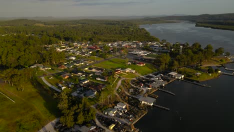 left to right sunrise, aerial views in the regional town of karuah, new south wales, australia.