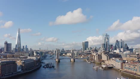 aerial slider drone shot of central london tower bridge from the east over thames day