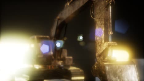 excavadora en la oscuridad con luces brillantes