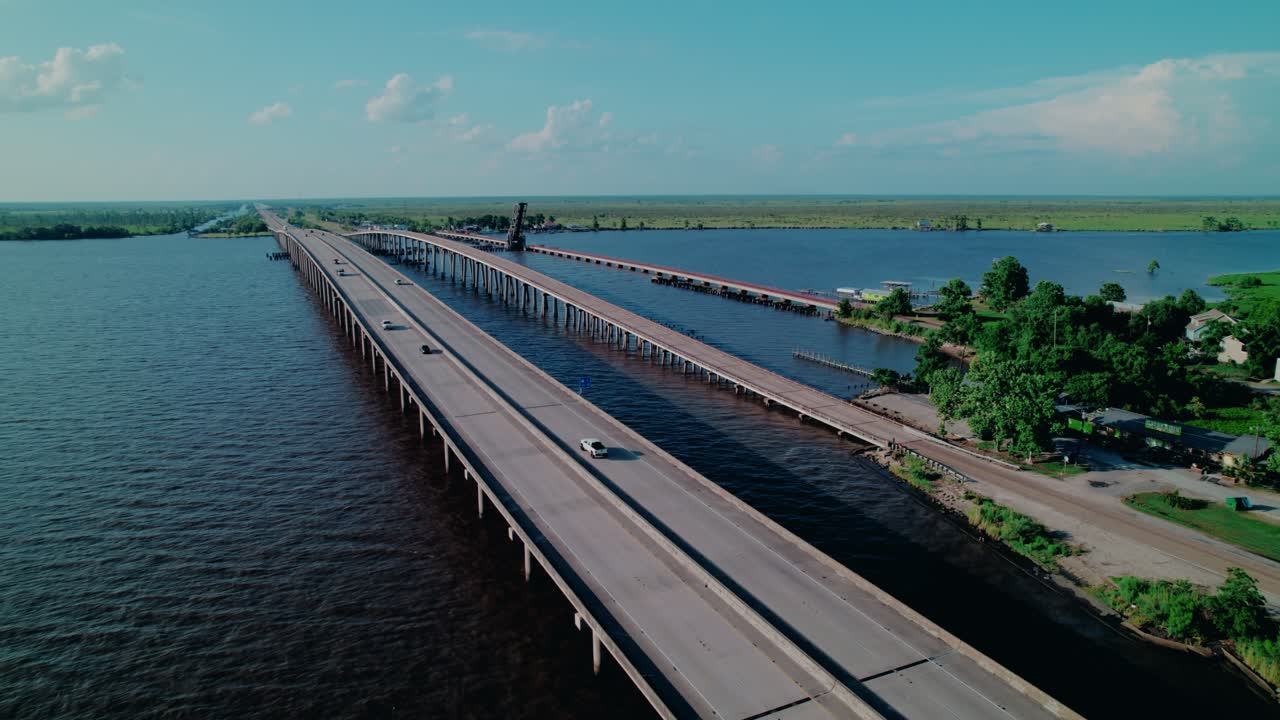 Aerial Shot of a Long Highway Bridge Spanning Coastal Waters in Louisiana