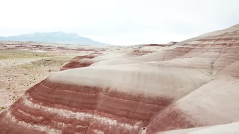 striped eroded rocky hills in utah desert usa