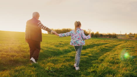 active elderly people running with their granddaughter