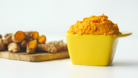 fresh turmeric paste and root