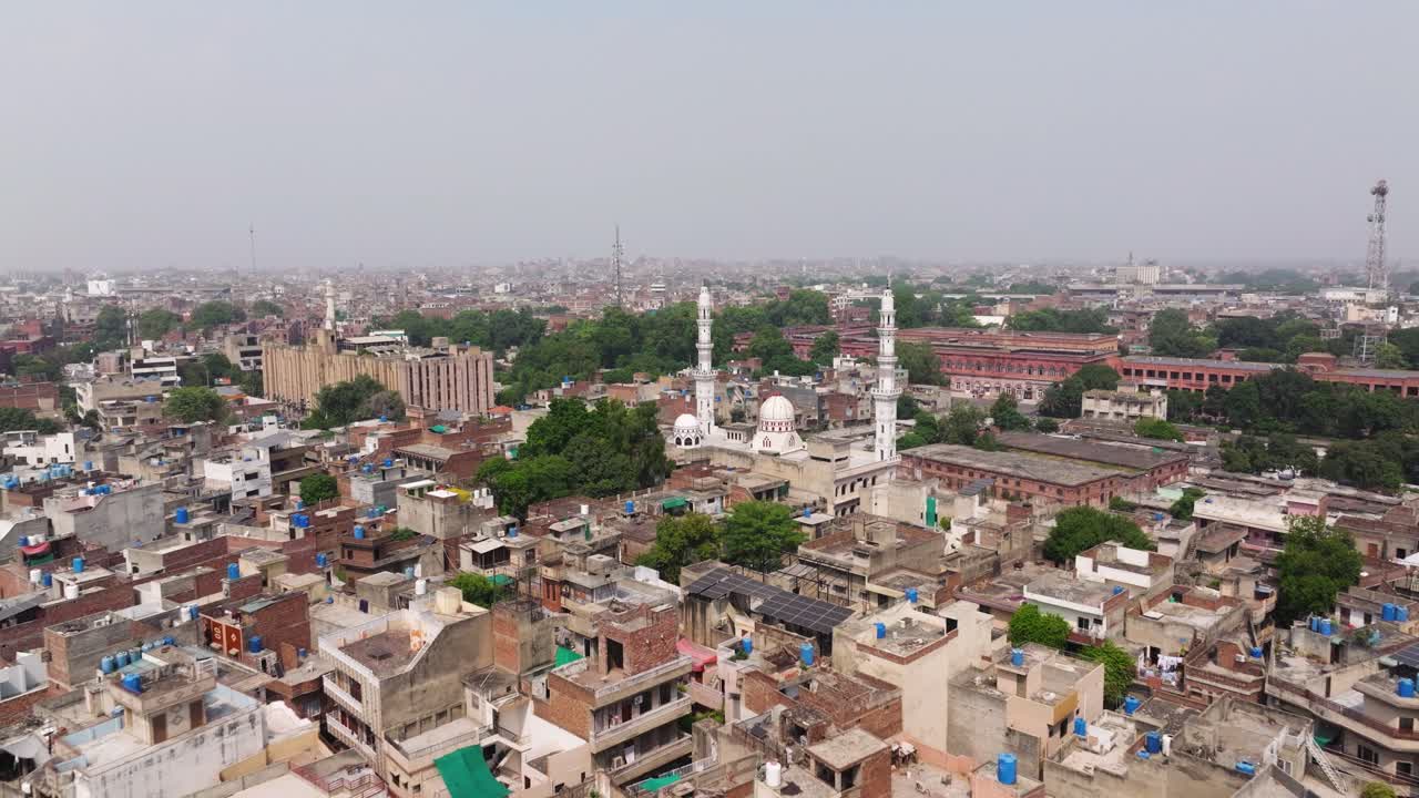 Aerial View of a Densely Populated City with a Mosque