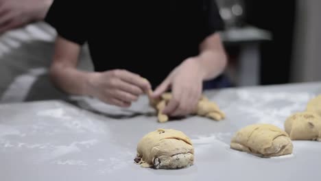 little boy learning to bake bread with his mother in the kitchen stock video