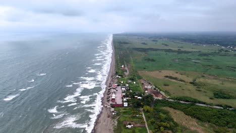 Backwards-drone-shot-of-nautla-Veracruz-mexico