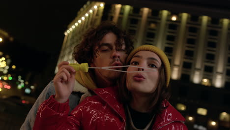 Man kissing woman&#039;s cheek.