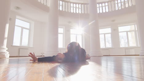 contemporary male japanese dancer training dance moves on the studio floor