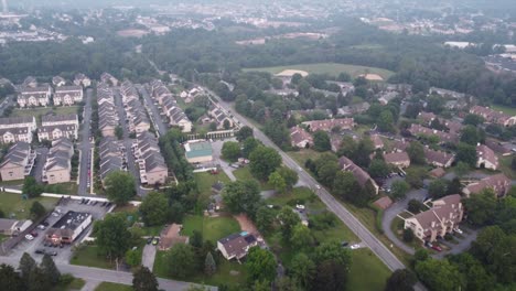 flying over a hazy small town