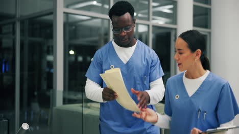doctors and nurses discussing patient care in a hospital