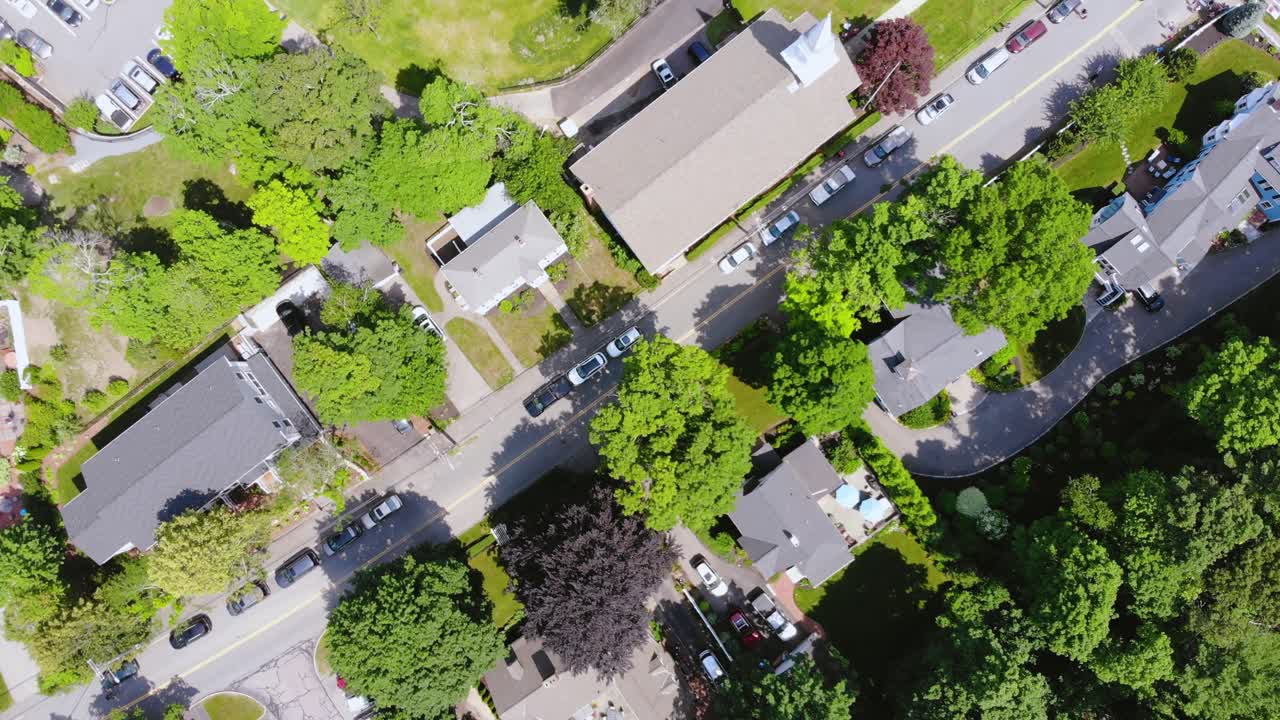 Aerial top down view of people marching on roads during a parade show