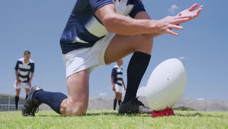 rugby players playing on field