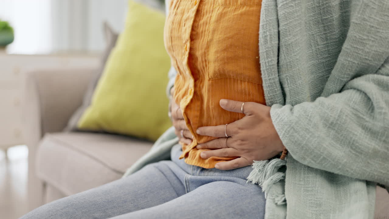 Stomach, cramps and woman with belly ache feeling