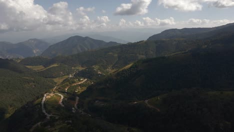 Mountains-in-central-Mexico,-latin-America,-hills-and-skyline-clouds,-aerial