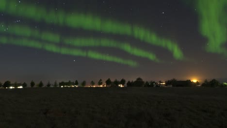 aurora borealis northern lights green color in the night sky