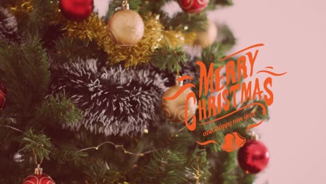 animación de felicitaciones de navidad texto sobre árbol de navidad y decoraciones