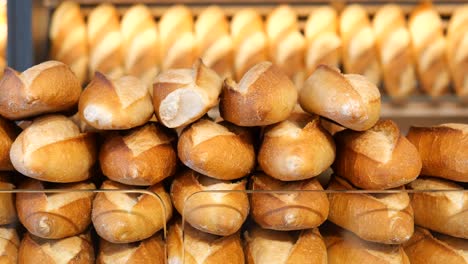 fresh baguettes in a bakery display