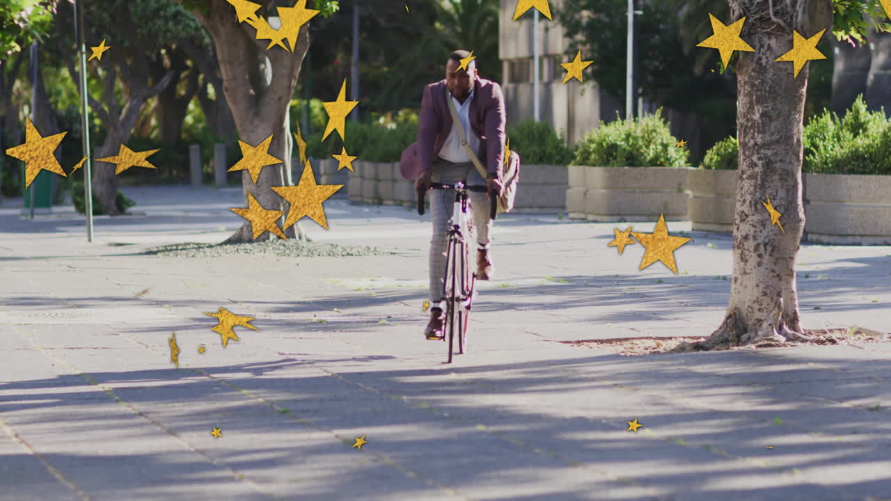 Riding bicycle on sunny street, man with animation of stars around him