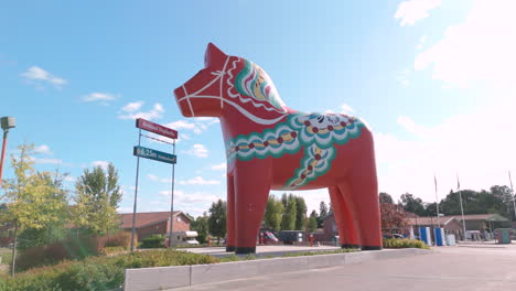the worlds largest dala horse in avesta, sweden, gimbal tracking shot