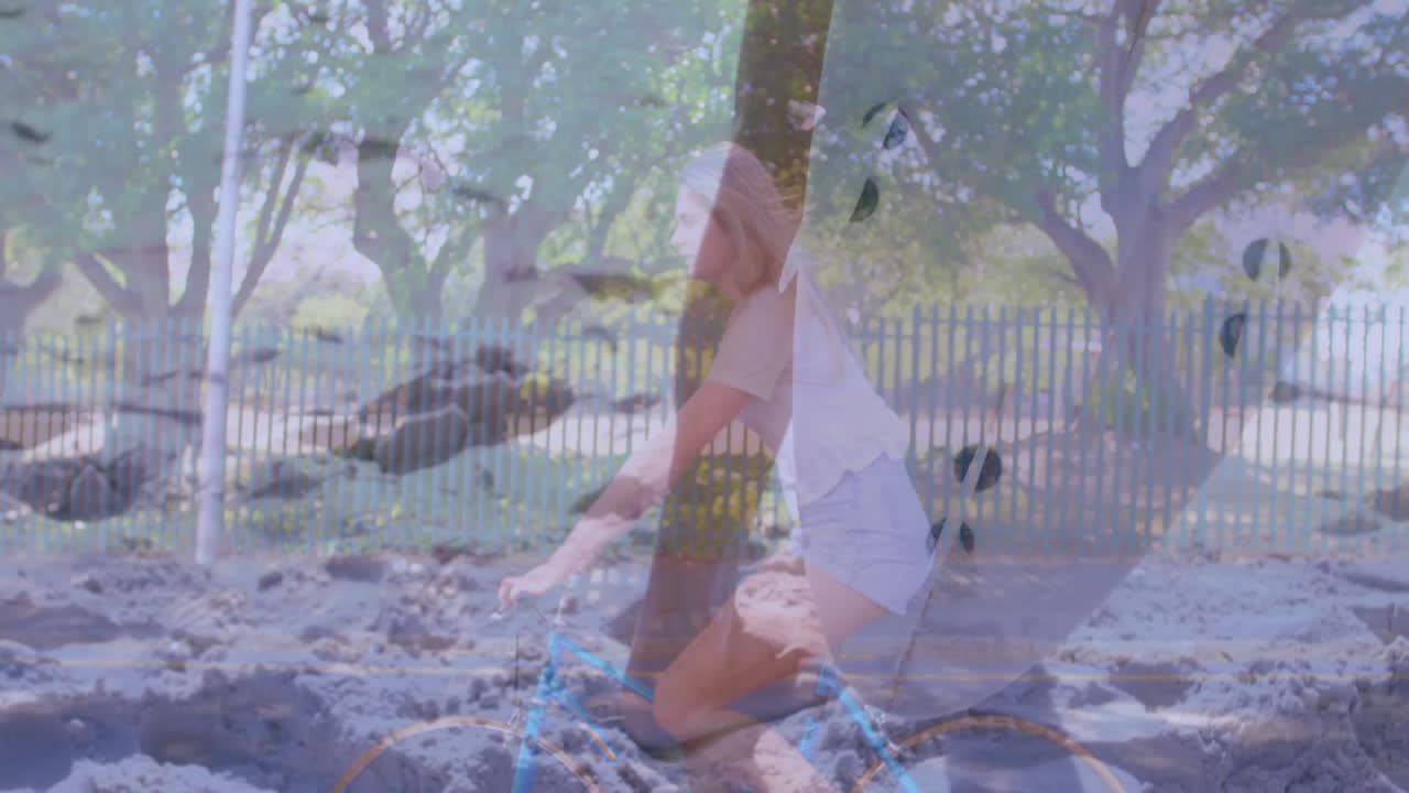 Riding bicycle through scenic park, woman enjoying trees and fence animation