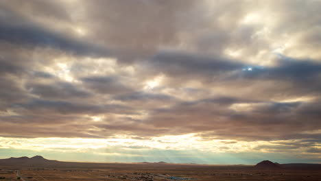 time lapse of a cloudscape over the mojave desert as seen from a high altitude drone