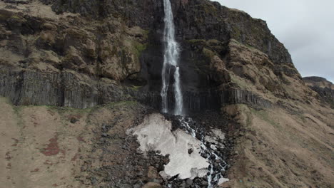 Bjarnarfoss-waterfall:-aerial-zoom-in-shot-of-a-fantastic-Icelandic-waterfall