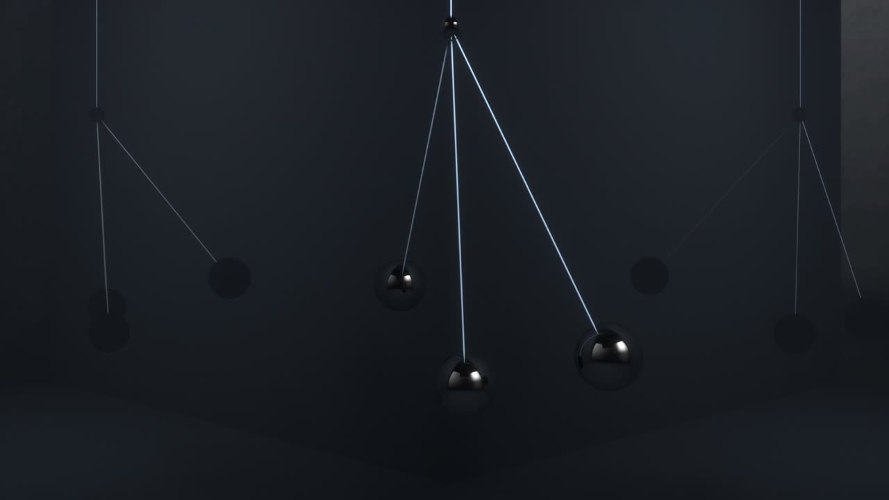 금속 공은 서로 충돌하지 않고 공중에 흔들립니다.