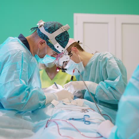 operating theater. teamwork of doctors performing a surgery with modern medical tools. surgeon's job in hospital.