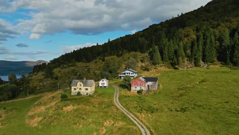 aerial over typical secluded houses near lauvstad in the volda municipality, norway