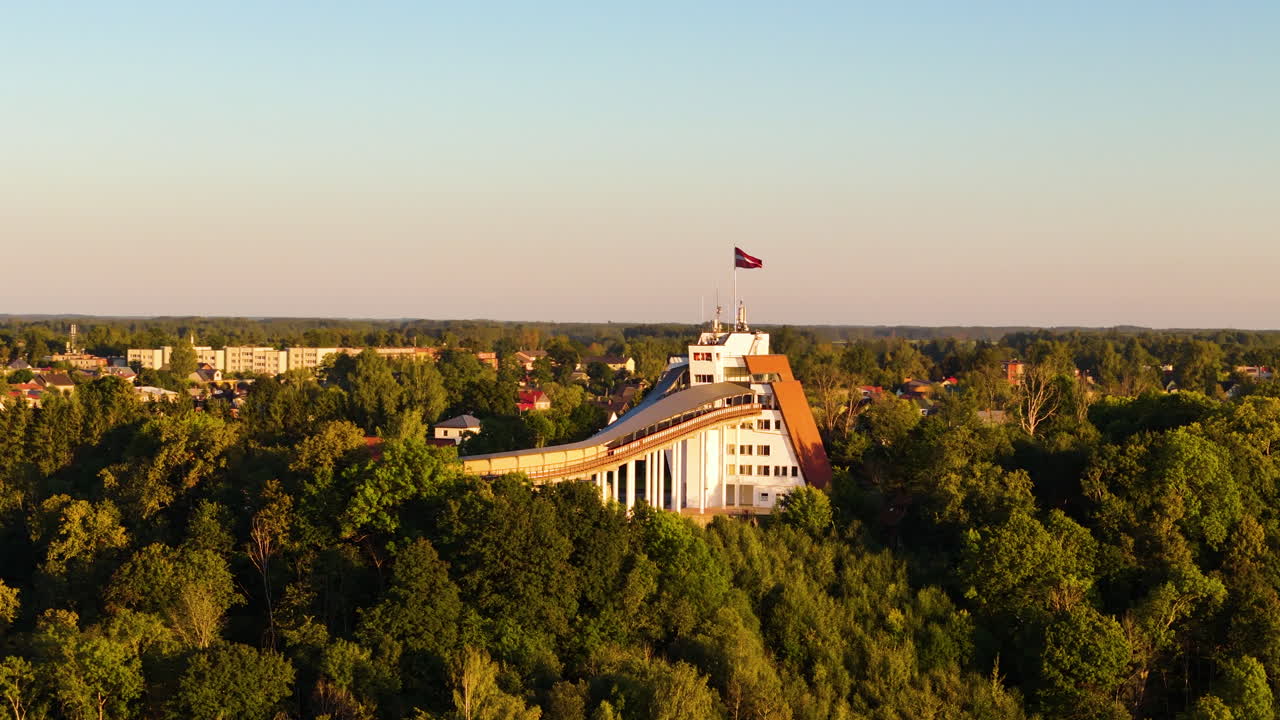 Sigulda Latvia: Baltic Travel, Adventures, Tours, Landmarks, And Attractions. 4K Aerial Circle Around The Historic Olympic Bobsleigh And Luge Track.